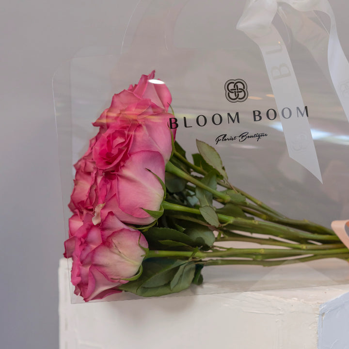 Bouquet of 12 dark pink roses