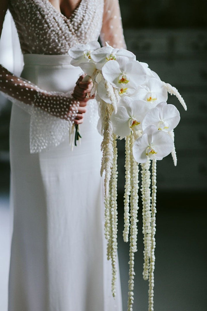 Bridal bouquet with orchid and dried amaranth