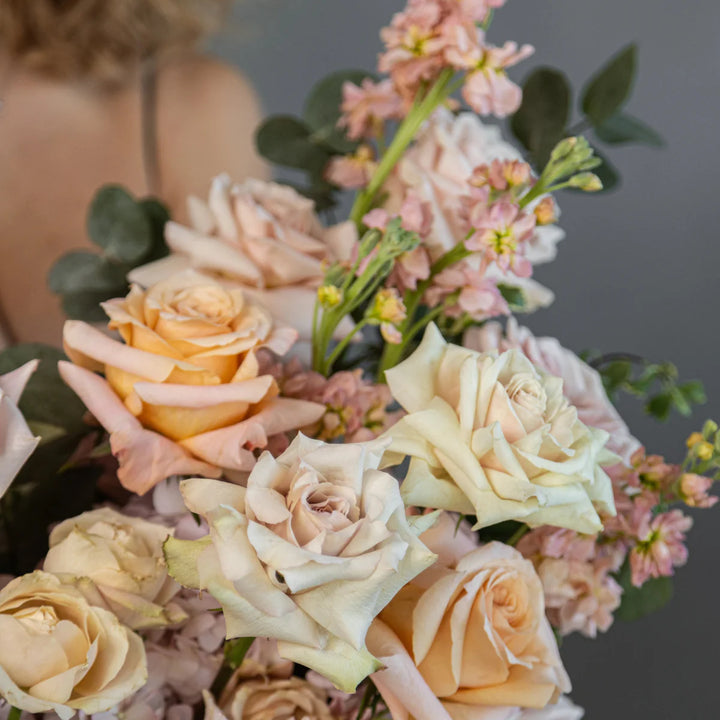Flower basket "Vanilla Sky" with roses, hydrangea, carnation and matthiola