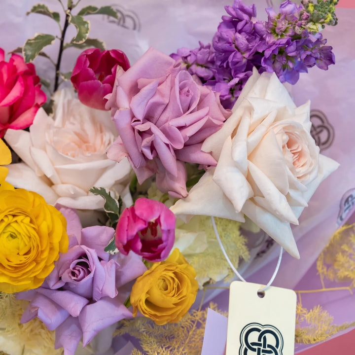 Small bouquet "Spring garden" with roses and tulips