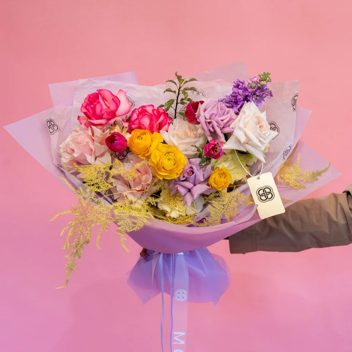 Small bouquet "Spring garden" with roses and tulips