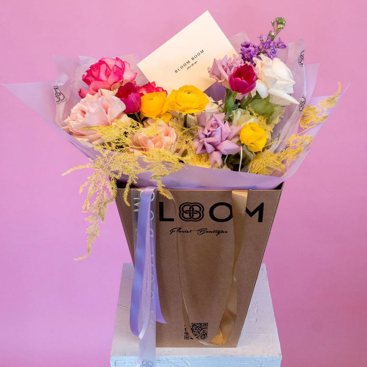 Small bouquet "Spring garden" with roses and tulips