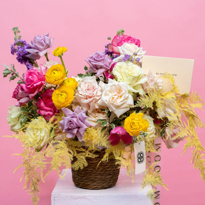 Flower basket "Spring Garden" with roses and tulips
